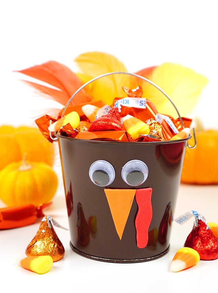 turkey shaped treat bucket filled with candy 