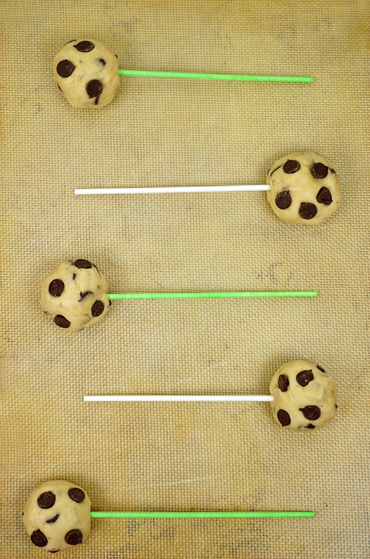 cookie dough on sticks before baking