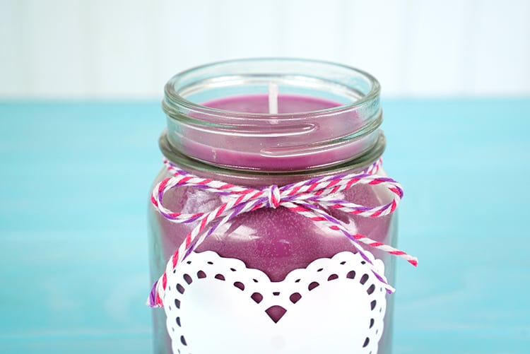 completed diy heart valentines mason jar candle