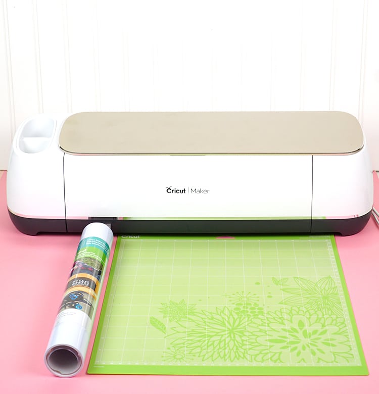 cricut maker and white vinyl with cutting mat
