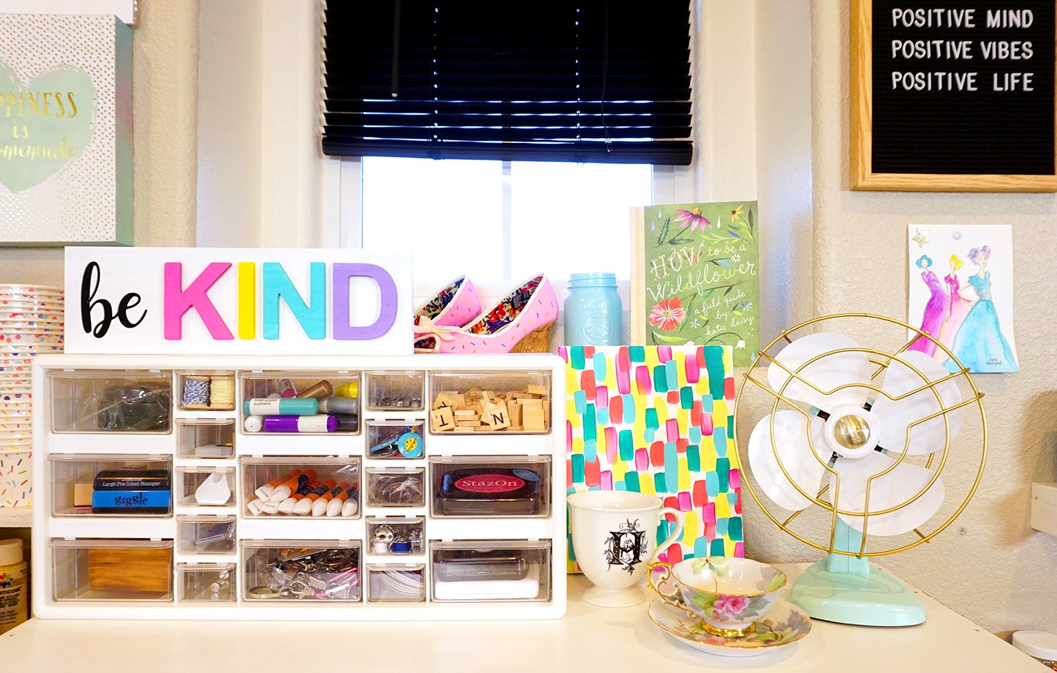 be kind sign and storage shelf 