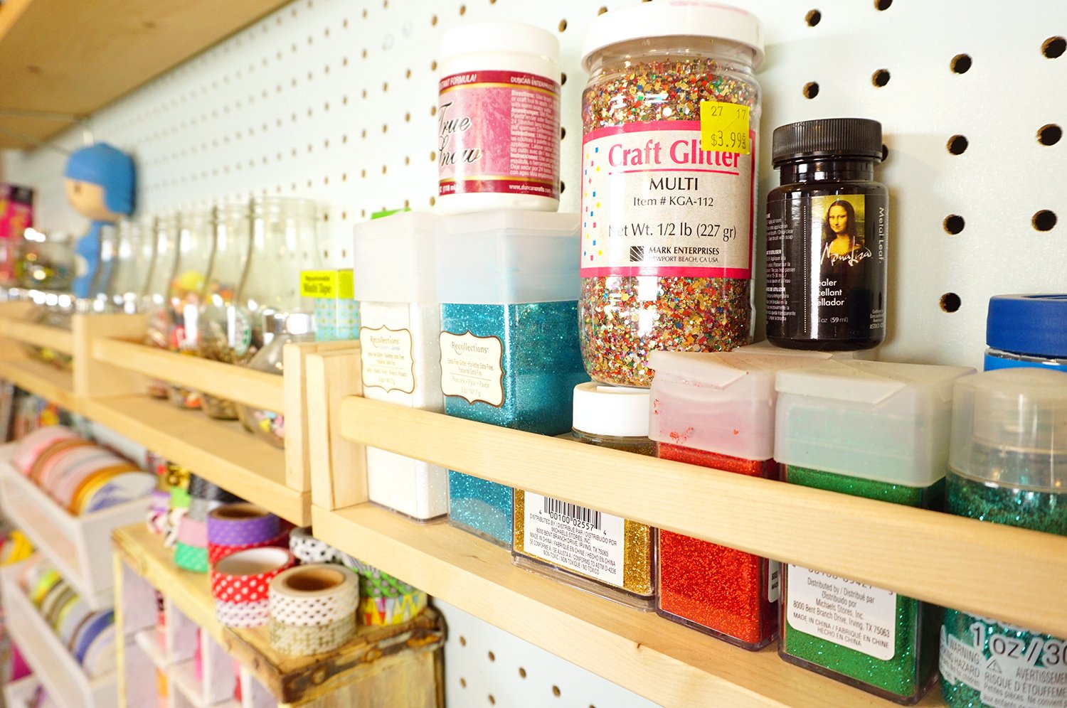 glitter stored in convenient spice rack storage