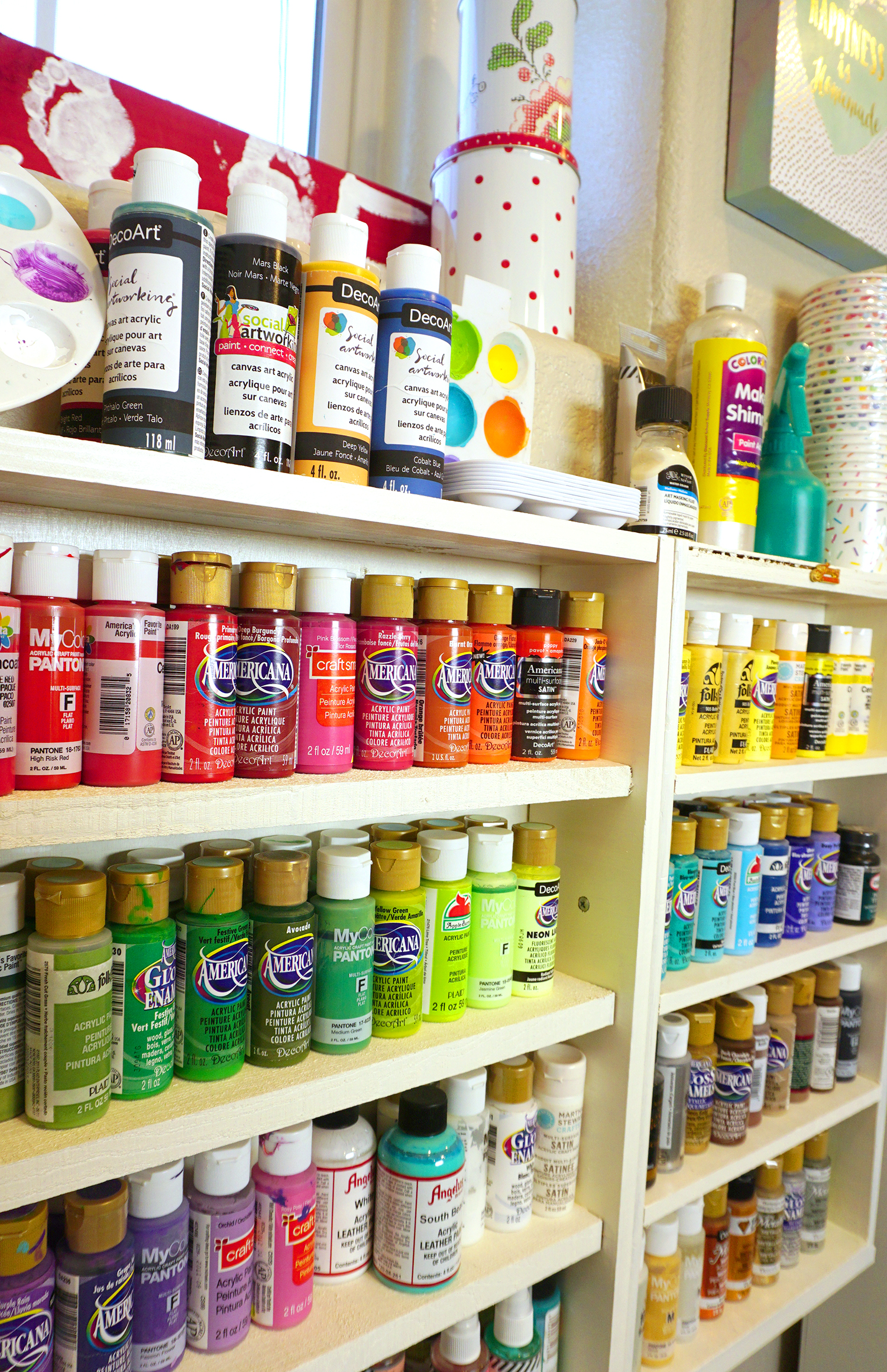 paints on shelves pretty storage organization