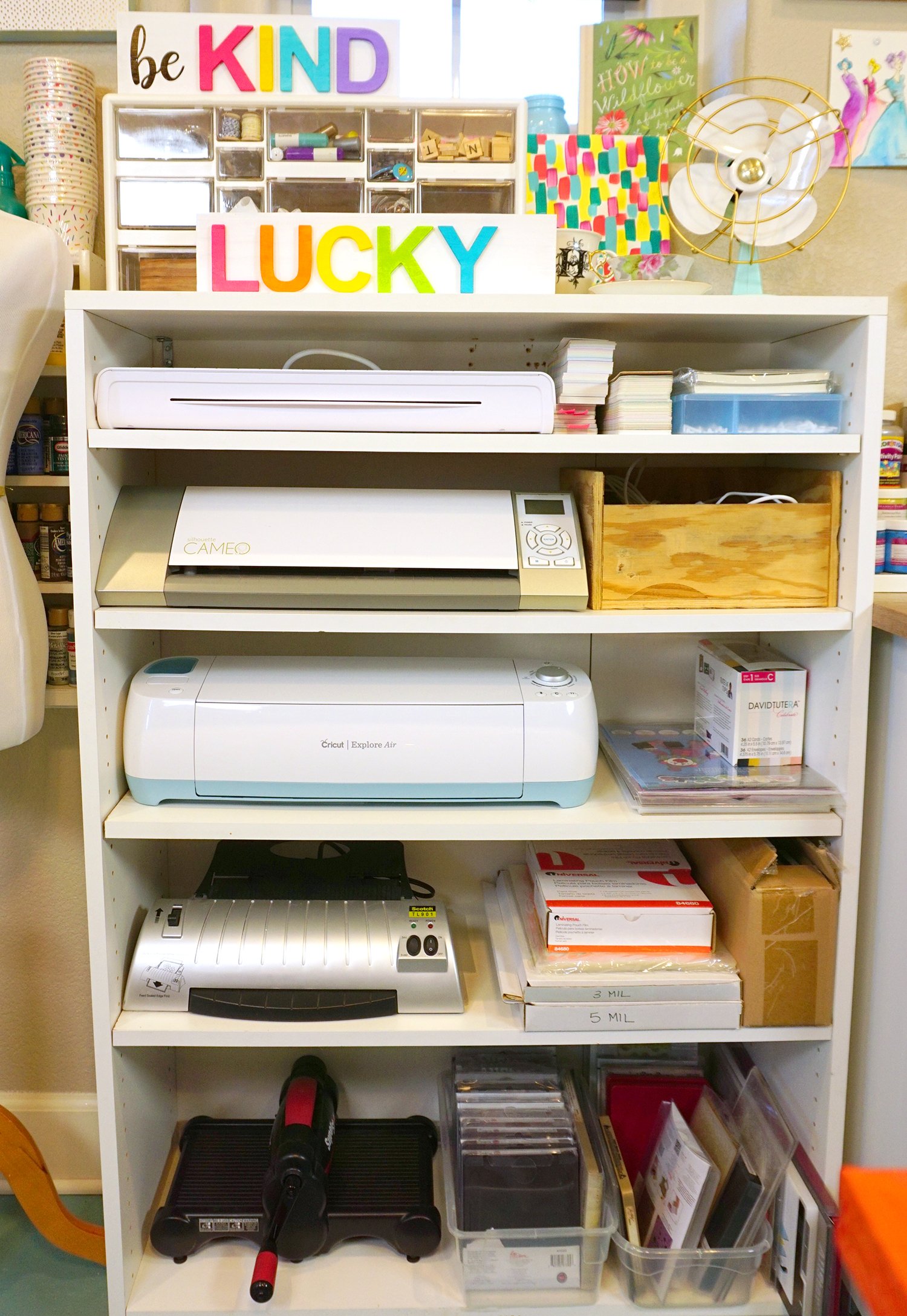 shelves of crafting with cricut machines