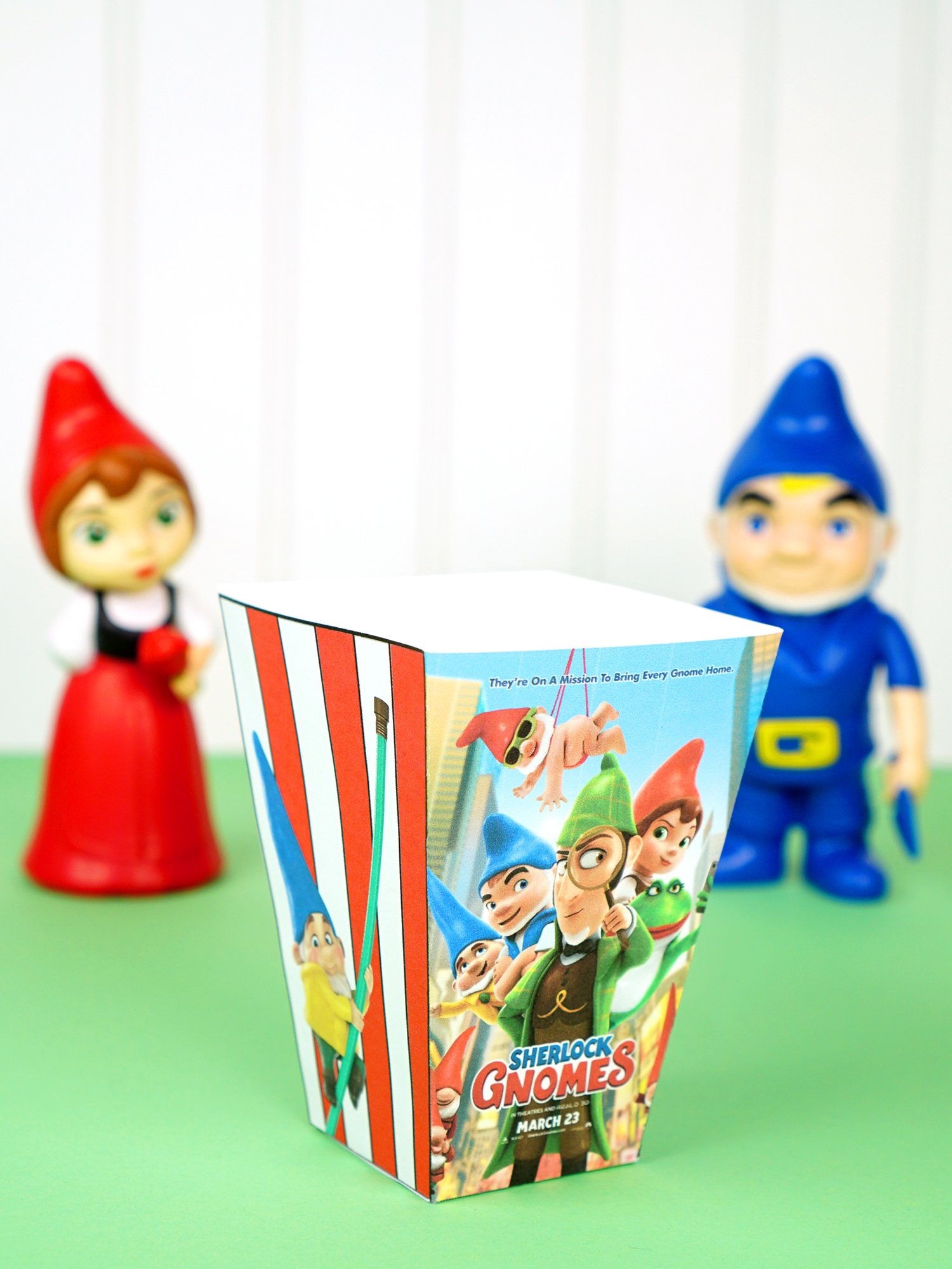 Sherlock Gnomes Snack Mix container and gnomes