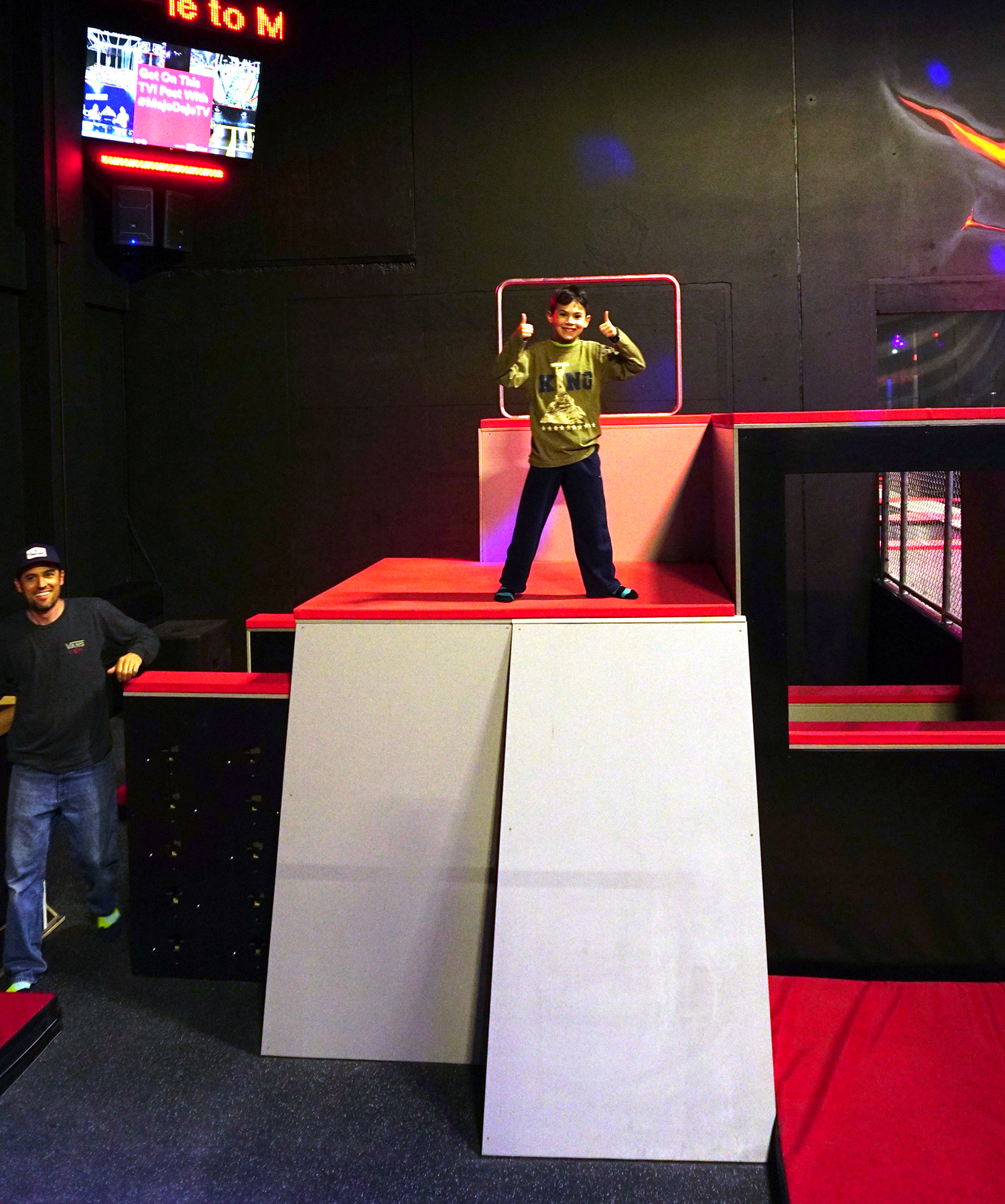 kid playing on the warped wall and parkour area 