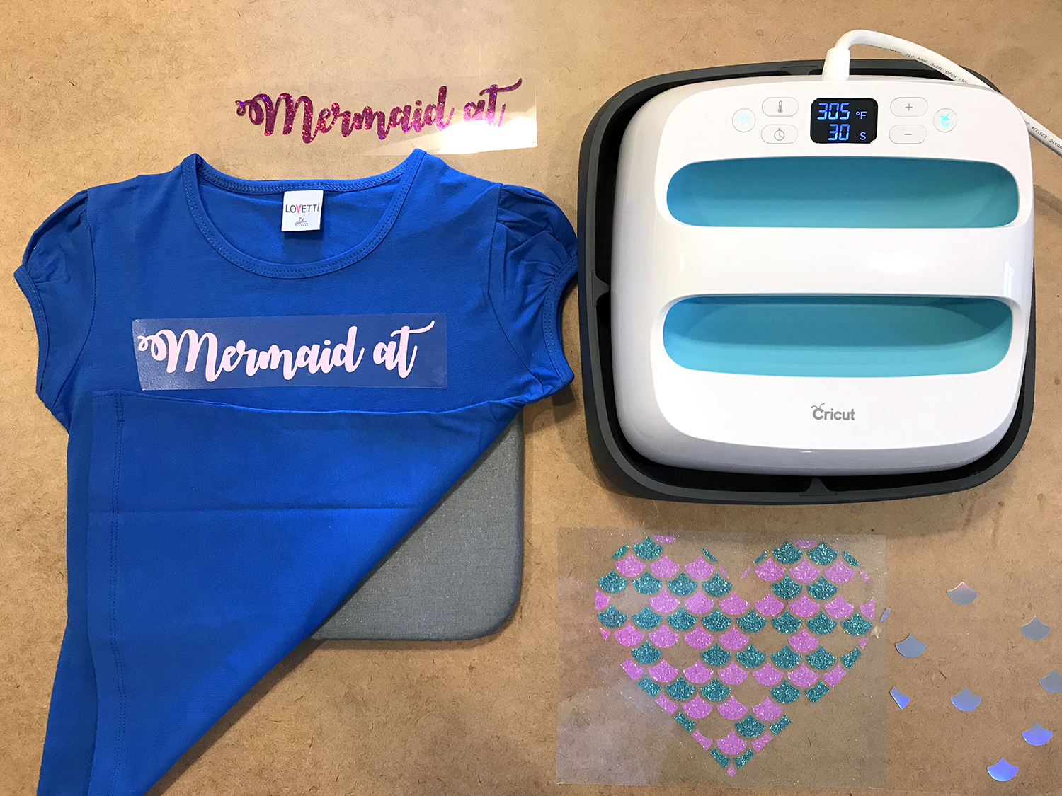 supplies for making a \'mermaid at heart\' shirt