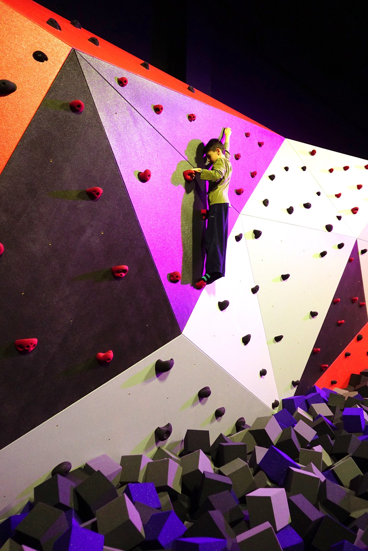 rock climbing wall being used by kid