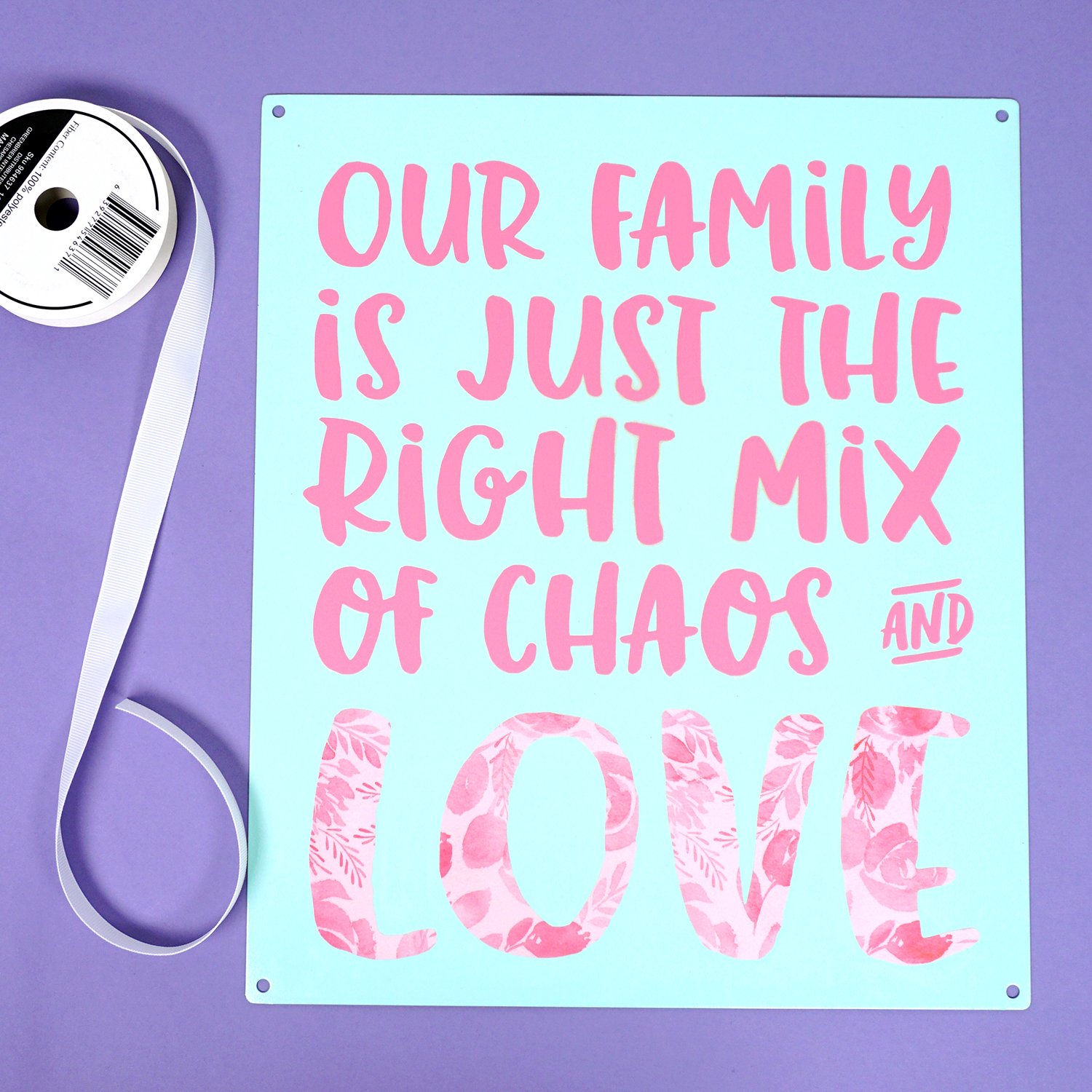 chaos and love metal family sign and ribbon