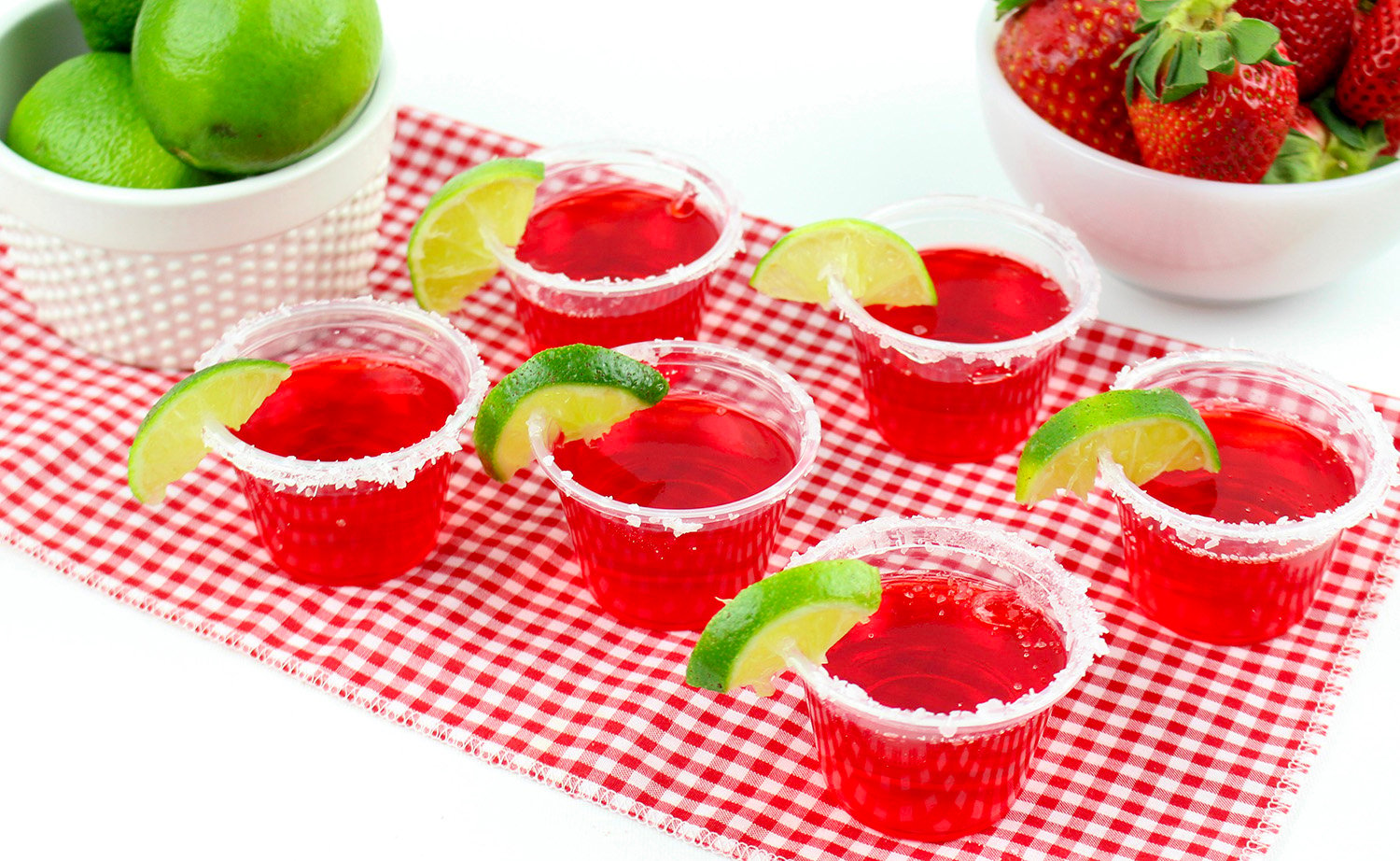 strawberry margarita jello shots on a table