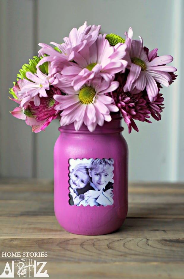 Mason jar vase with kid\'s photo and flowers