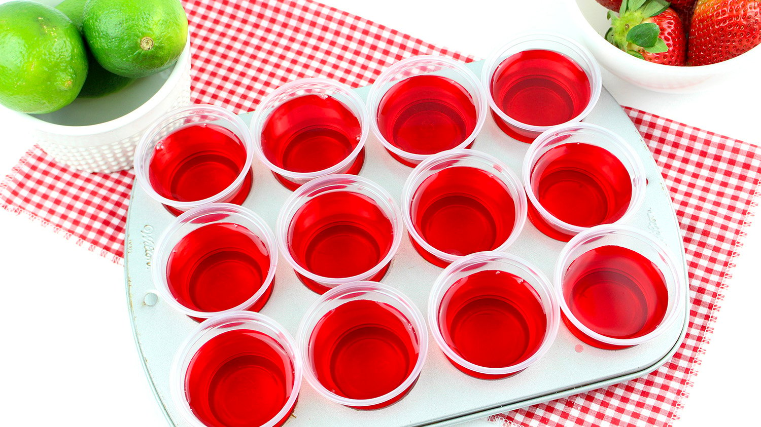 strawberry margarita jello shots in a tray