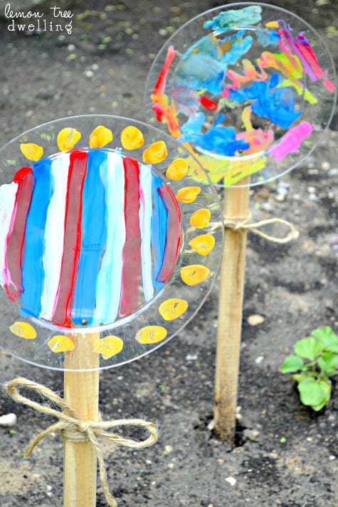 painted garden flowers on garden sticks