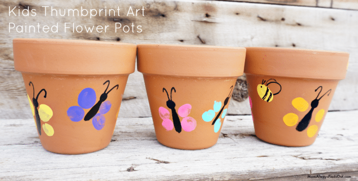 Flower pot decorated with children\'s thumb prints made into pretty butterflies