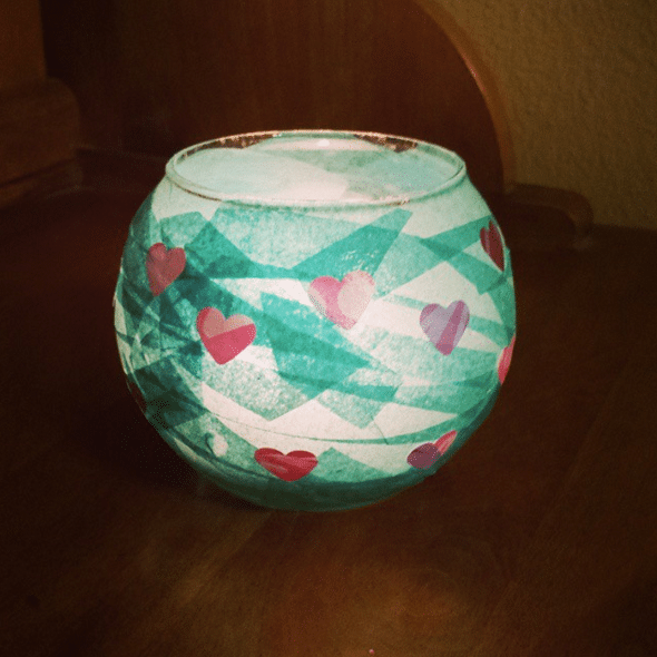 Tissue paper and hearts transferred onto a vase using mod podge