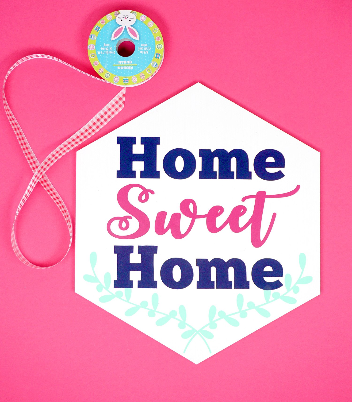 ribbon and home sweet home sign 