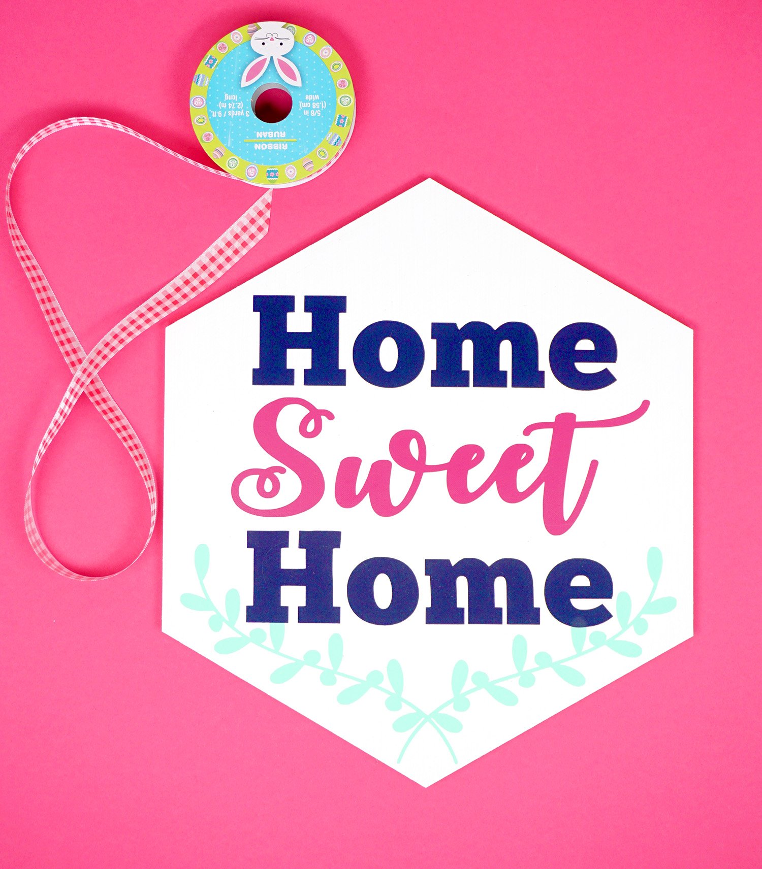 ribbon and home sweet home sign