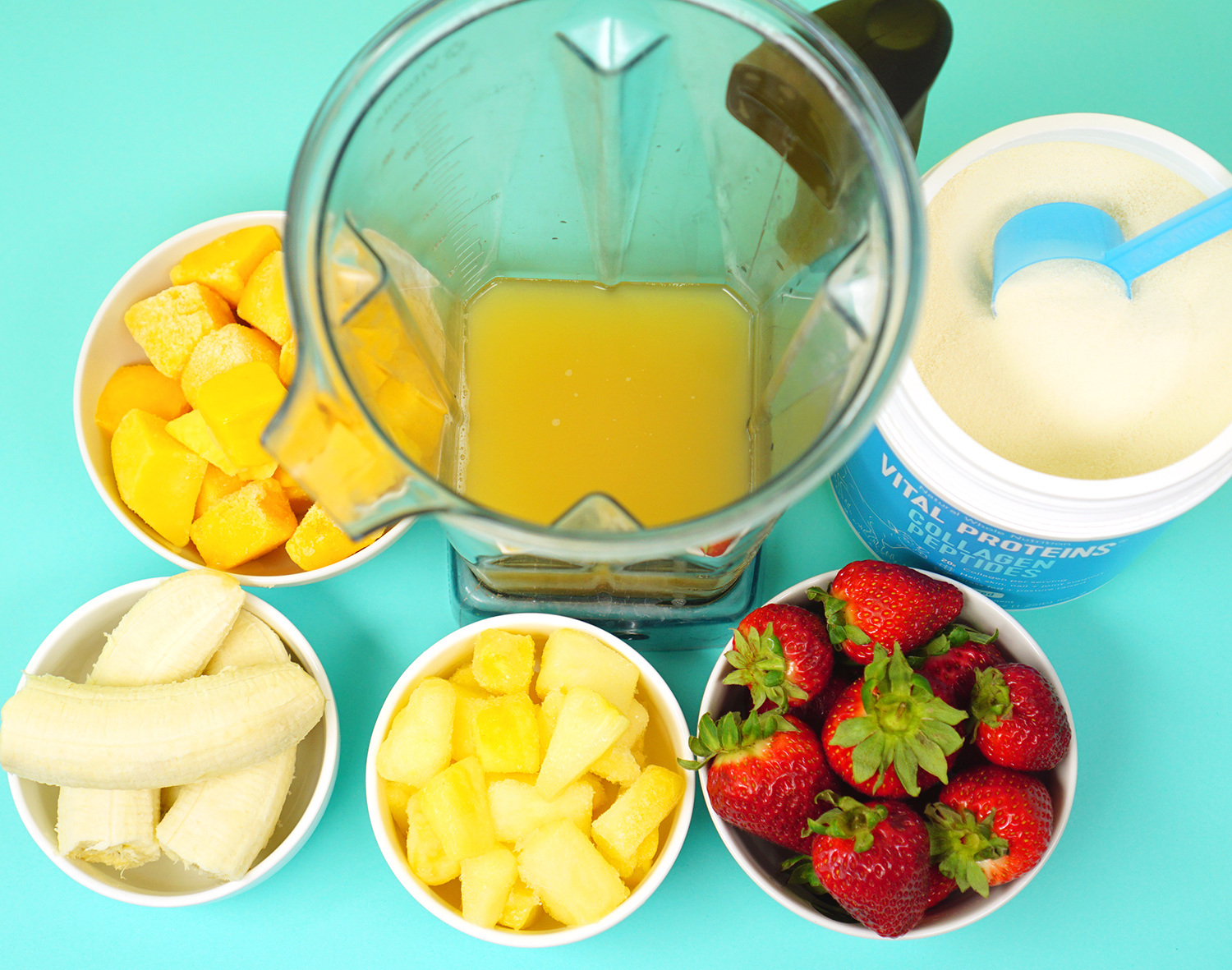 Making a Tropical Smoothie with Bowls of Fresh Fruit