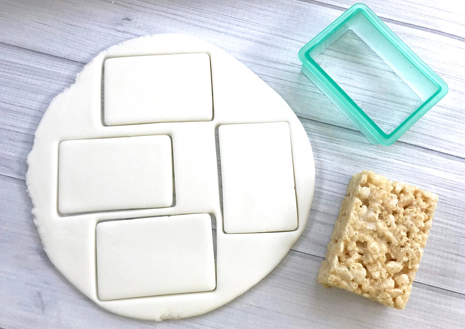 fondant with rectangle cookie cutter and rectangles cut into fondant