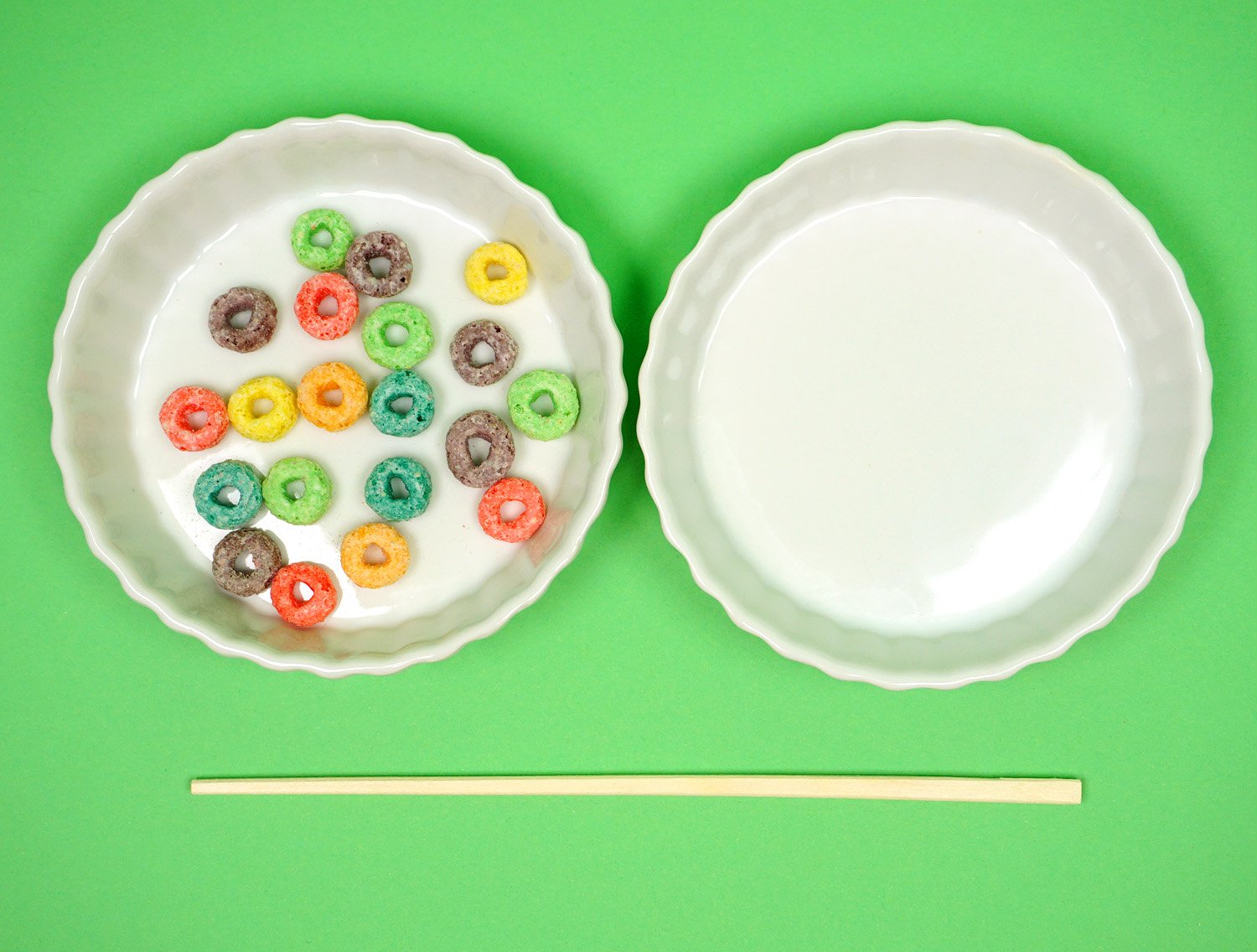cereal in dish and empty dish with chop stick