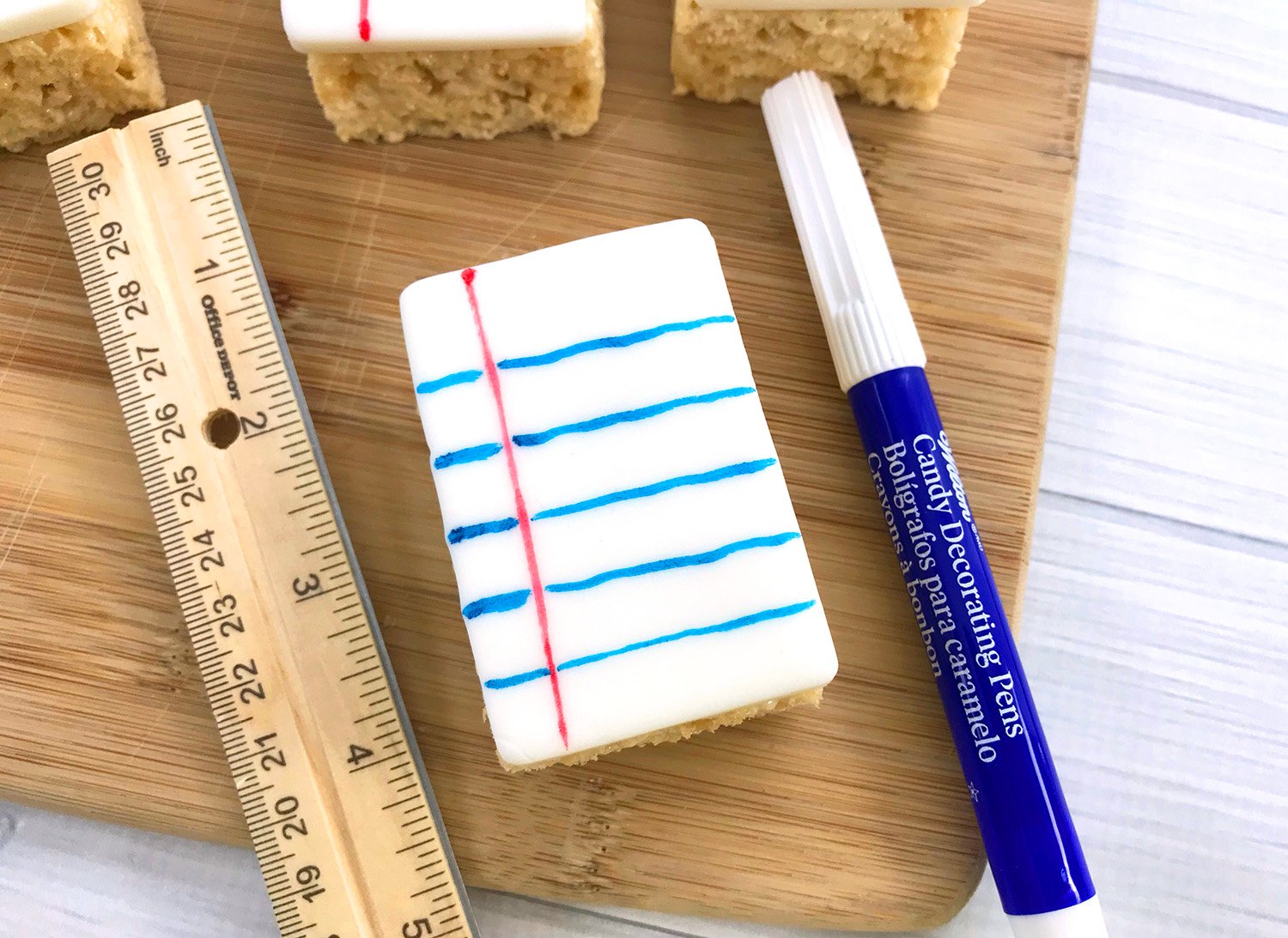 binder paper lines drawn onto treats and edible markers