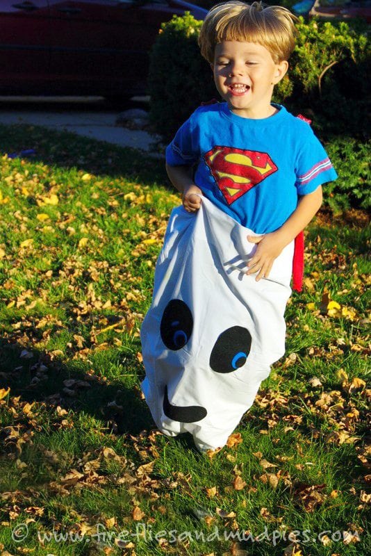 child playing halloween sack race 