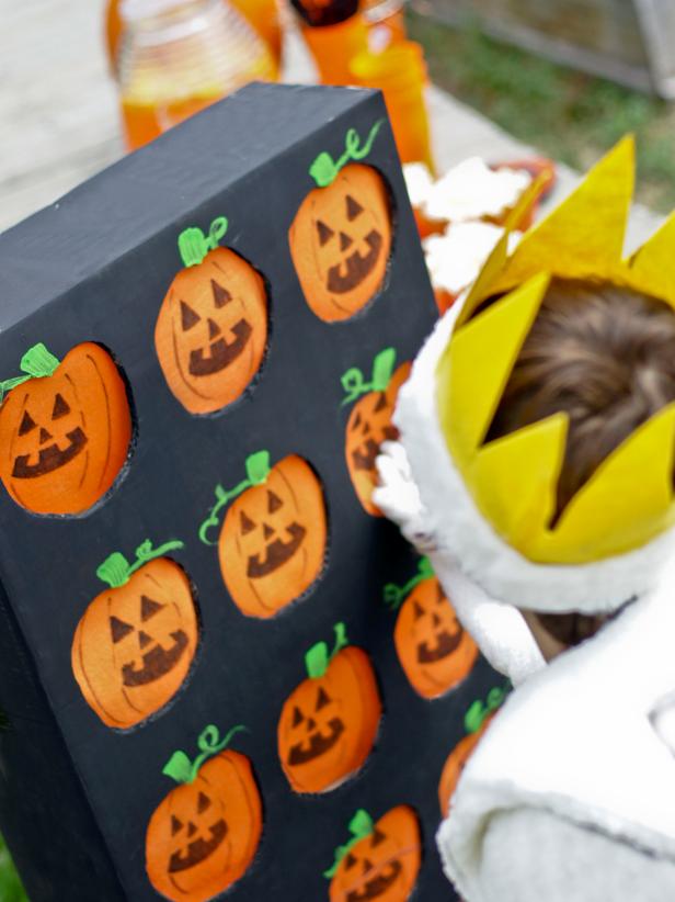 halloween punch box game with pumpkin faces 