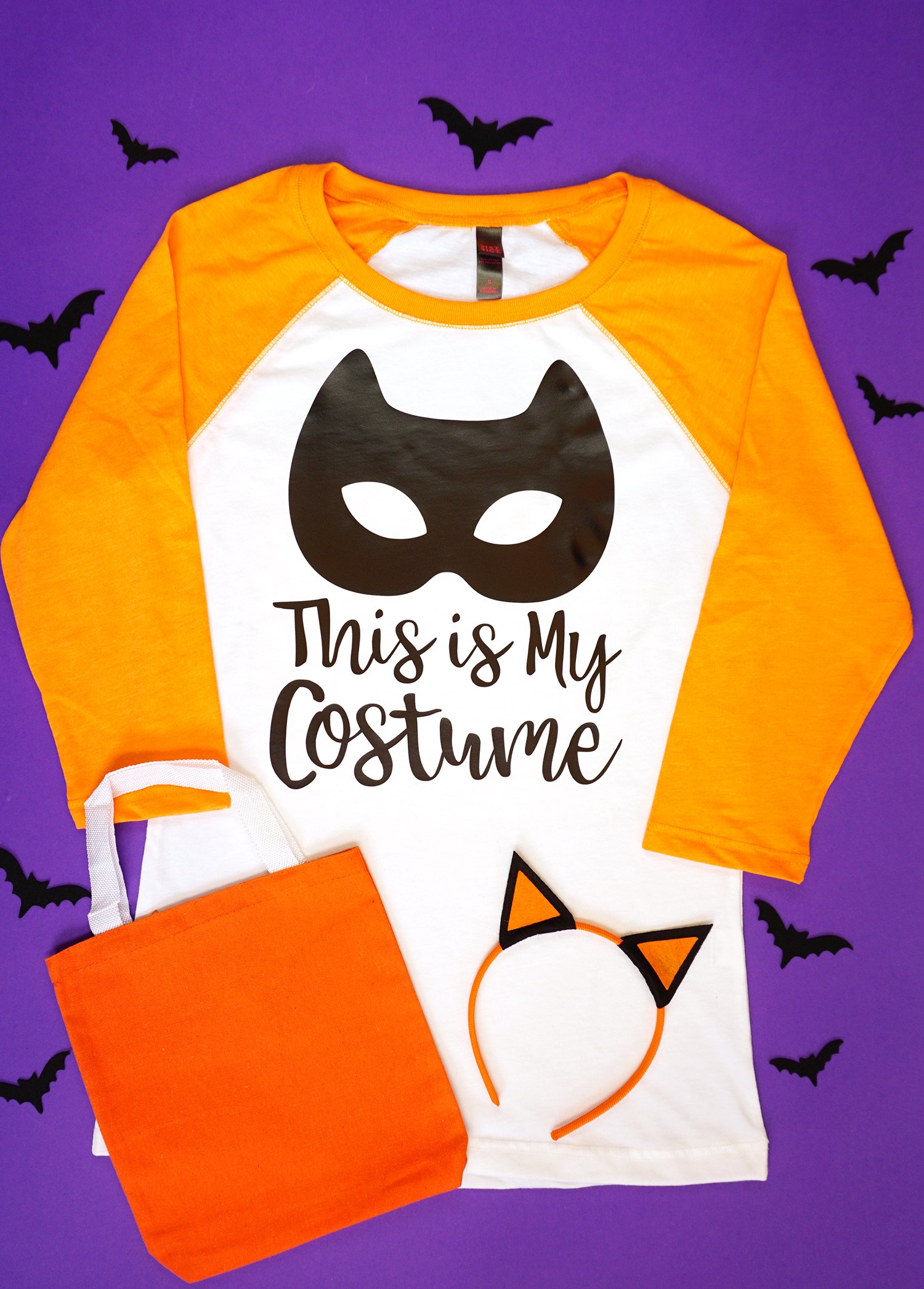 halloween shirt and costume ears and candy bag