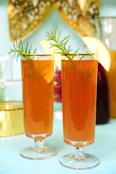 apple pomegranate cocktails in tall glasses