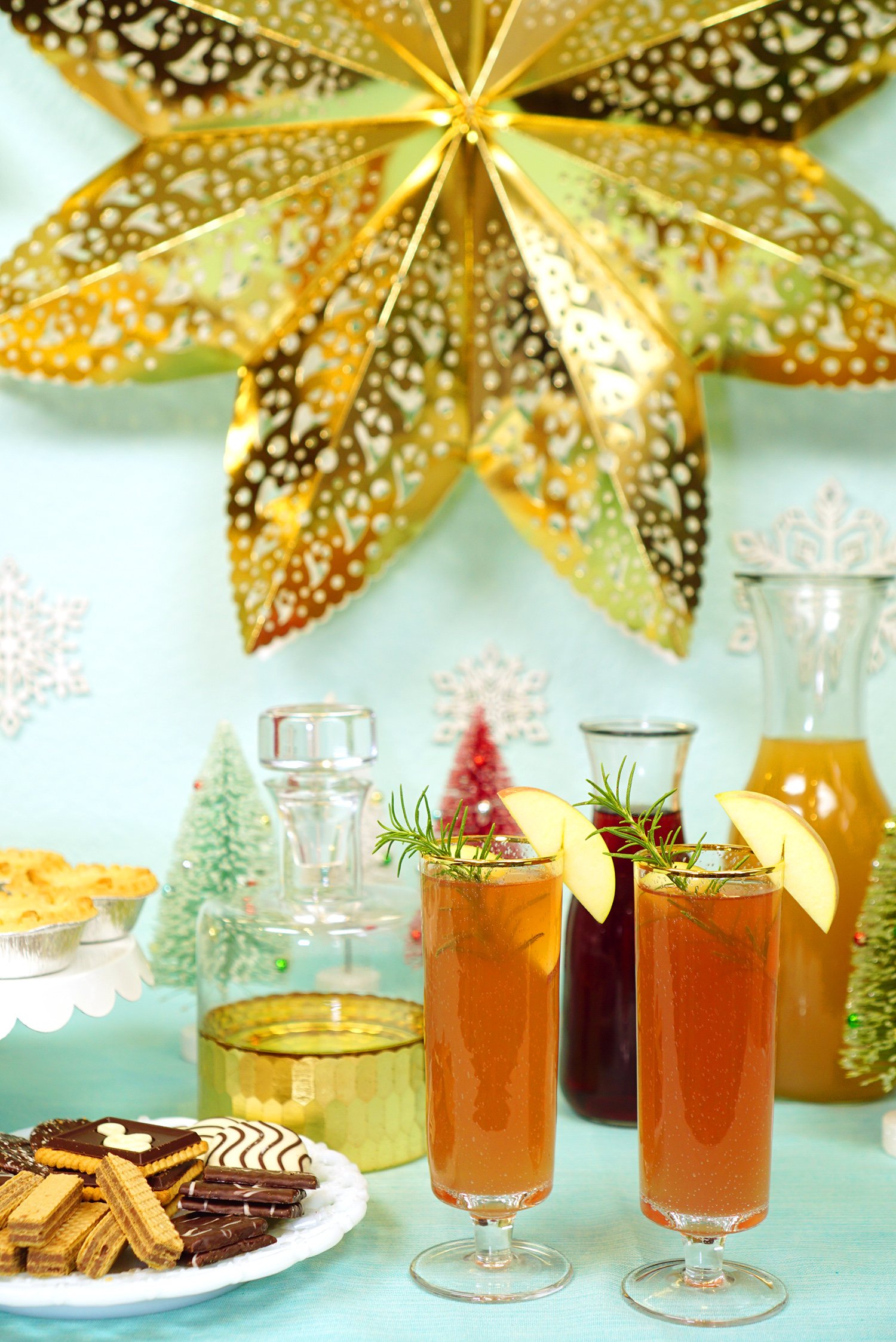 holiday cocktail party table decorated with drinks