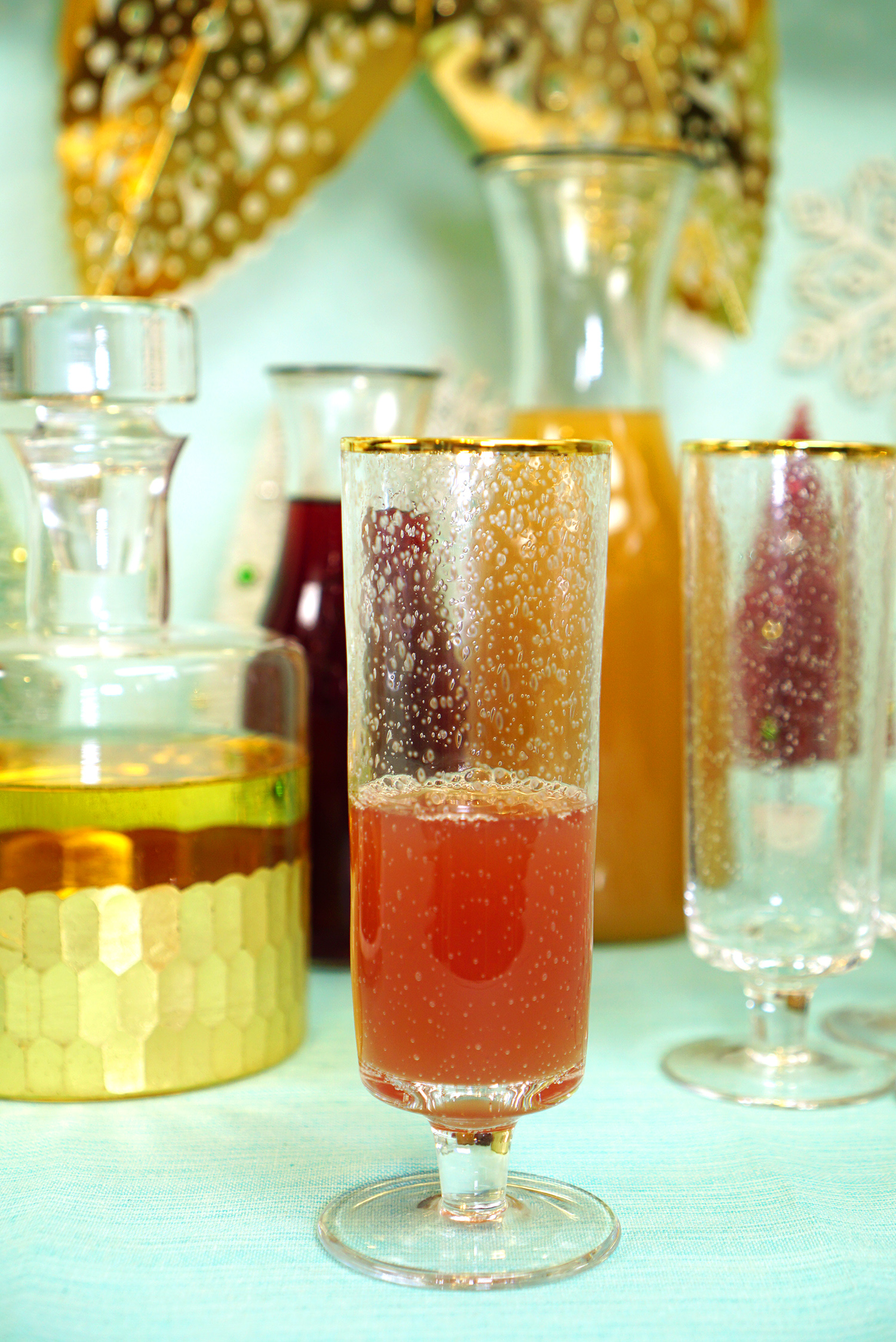 apple mimosa being made in glass