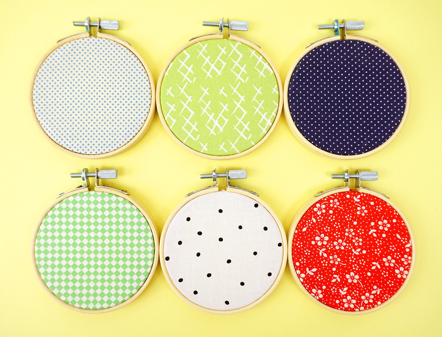 various patterns inside of embroidery hoops
