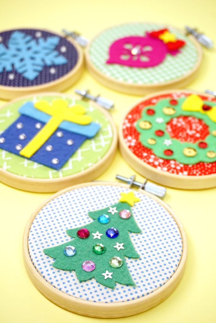 close up of mini felt hoop ornaments for christmas