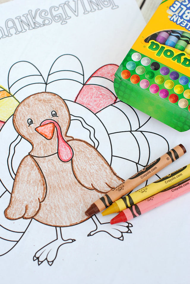 Close up of partially colored turkey Thanksgiving coloring page