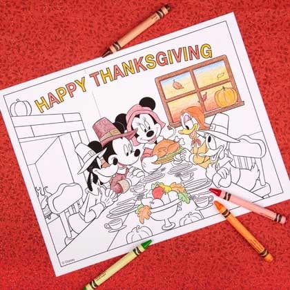 Partially colored Disney Thanksgiving coloring page featuring Mickey Mouse, Minnie, Donald and Daisy Duck, and Goofy on a red background