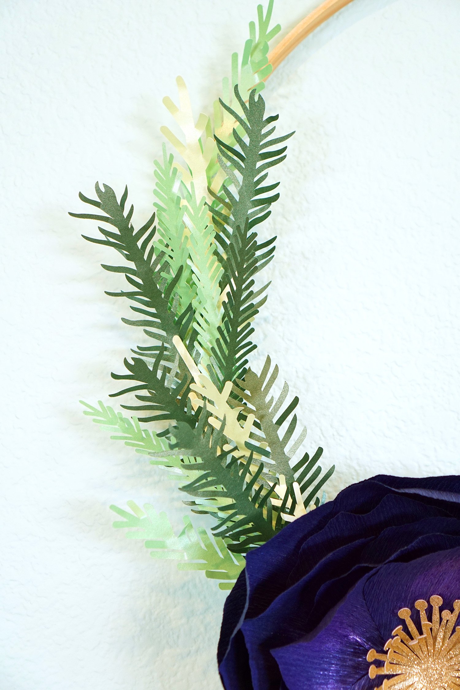 paper pine branches added to back of crepe paper flowers