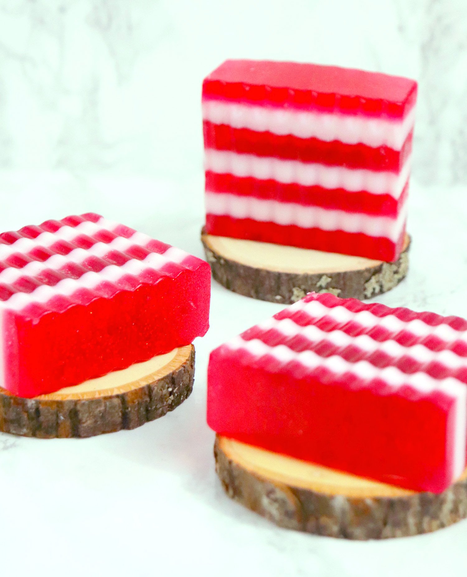 candy cane peppermint soap on wood rounds