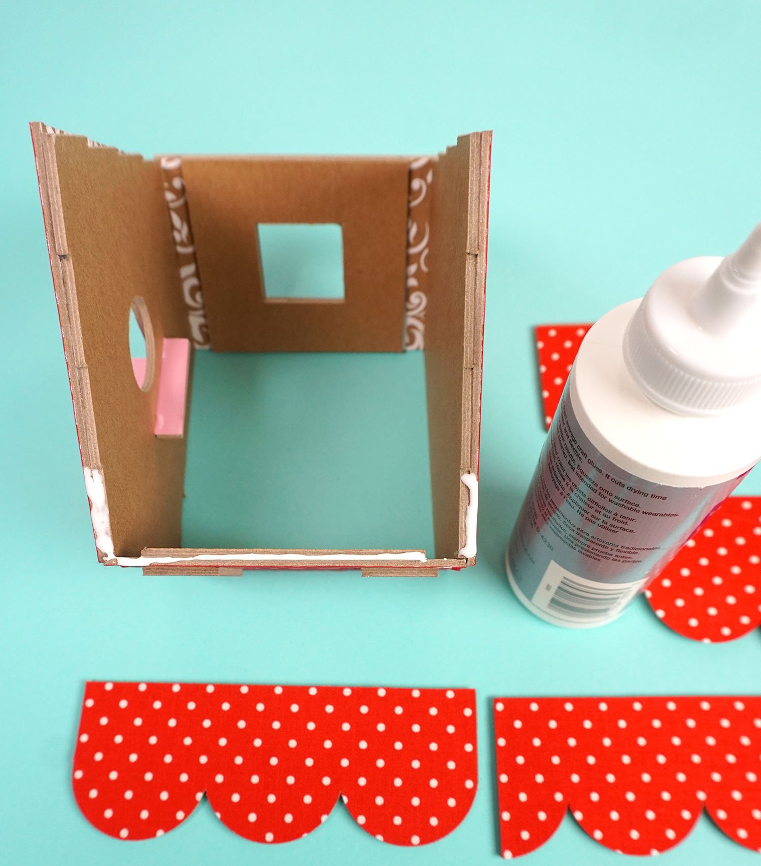 sides of bird house being held together with glue