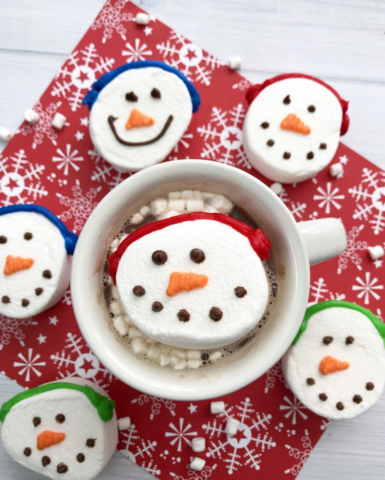snowman face marshmallows melting in hot chocolate 