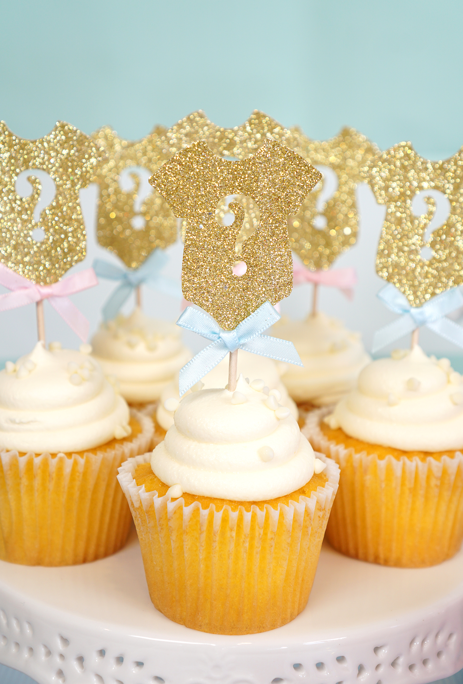 gender reveal cupcakes with question mark toppers