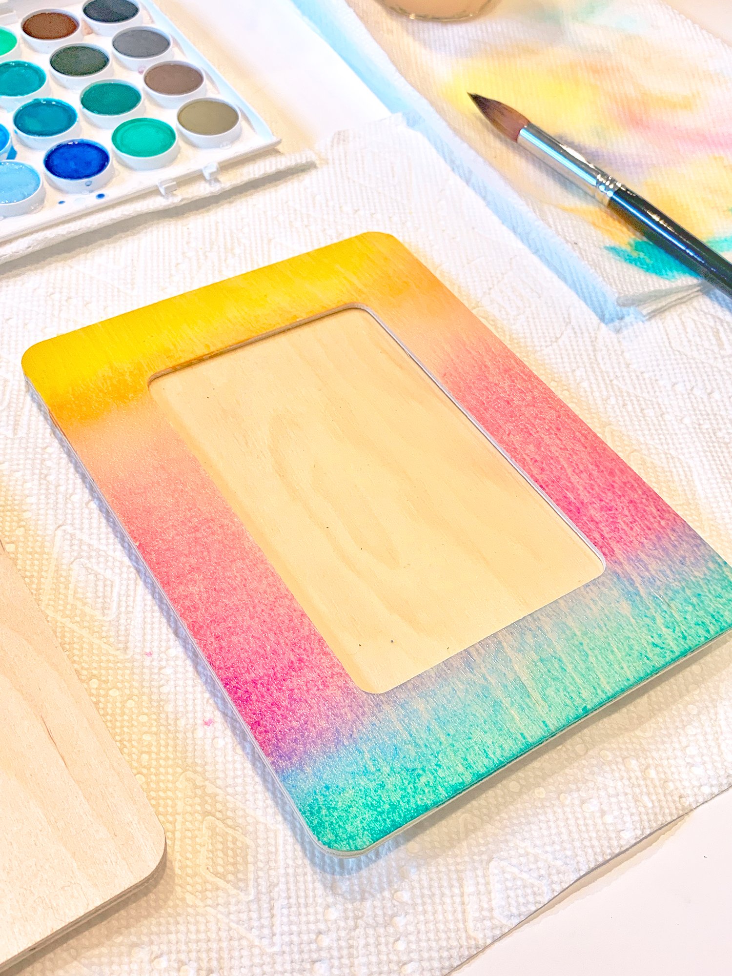 wooden photo frame painted with watercolors