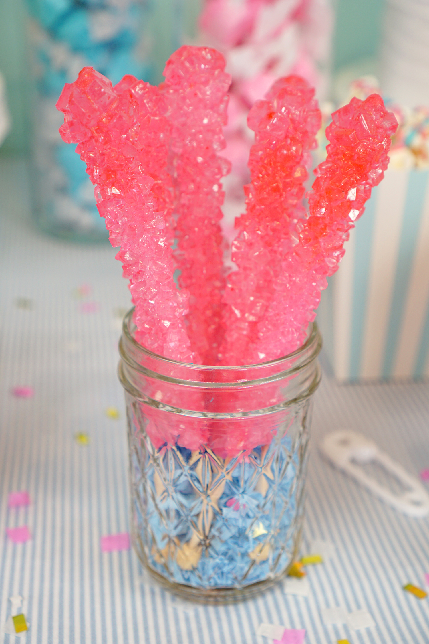 pink rock candy in mason jar 