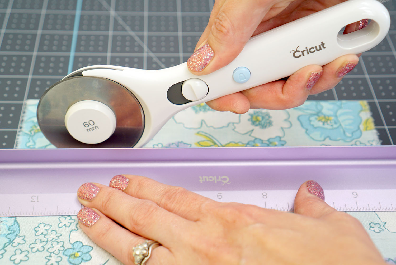 hand using cricut rotary cutter