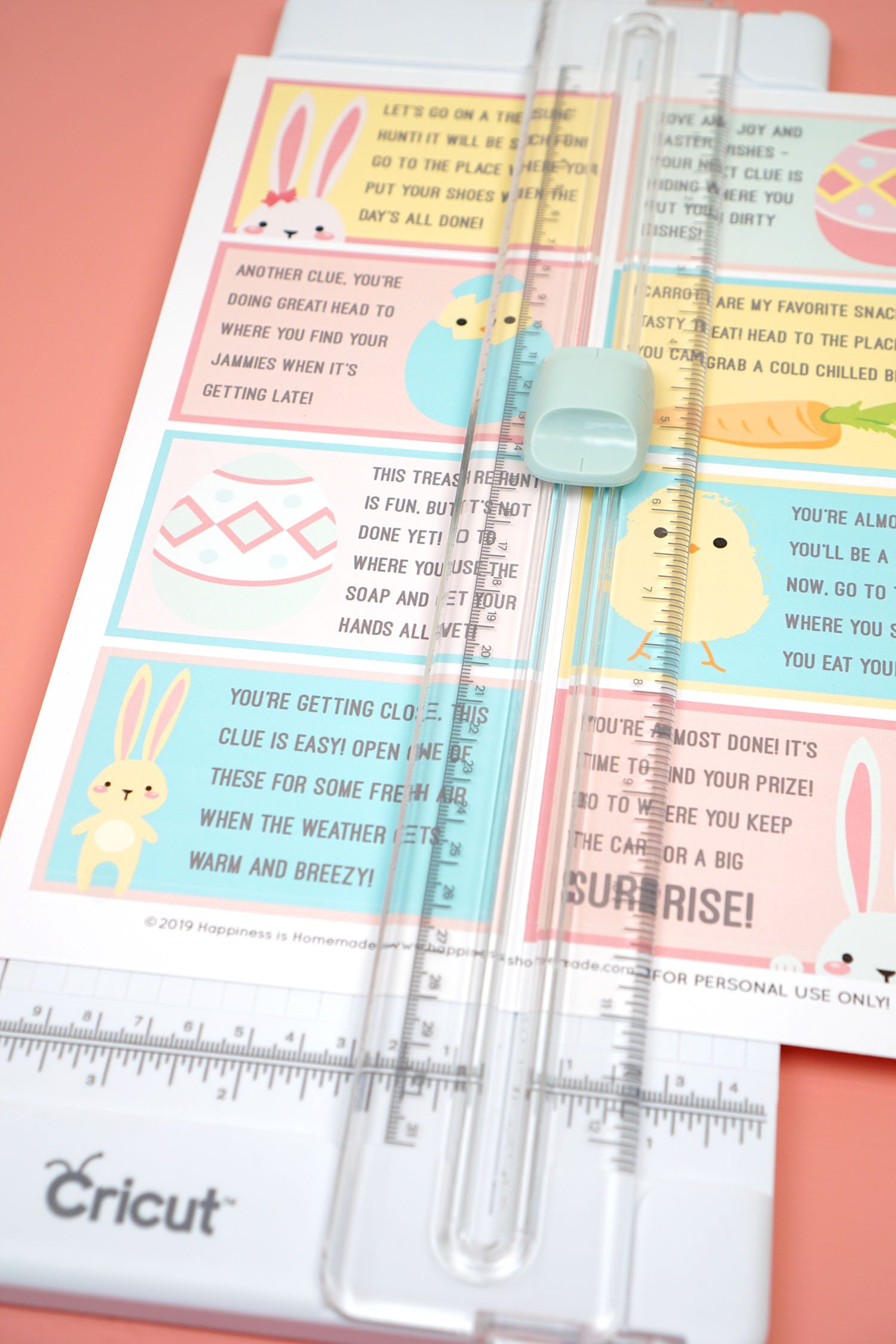 Easter Scavenger Hunt Cards being cut on the Cricut Paper Trimmer