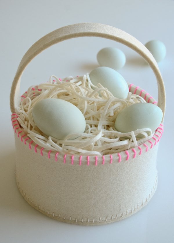 white easter basket made from felt with eggs