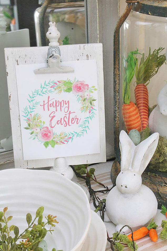 happy easter printable sign hung up with decorations