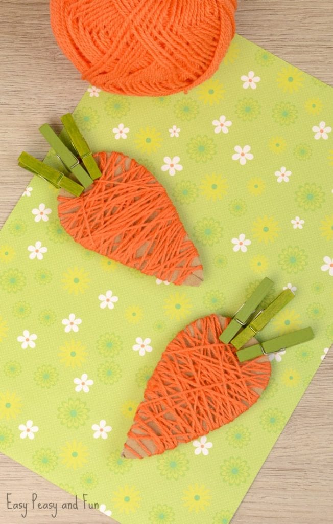 string wrapped carrots with clothespin leaves 