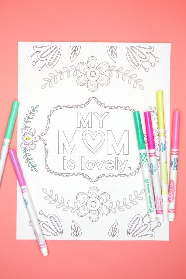 Printable coloring page that reads "My Mom Is Lovely" with coloring pens