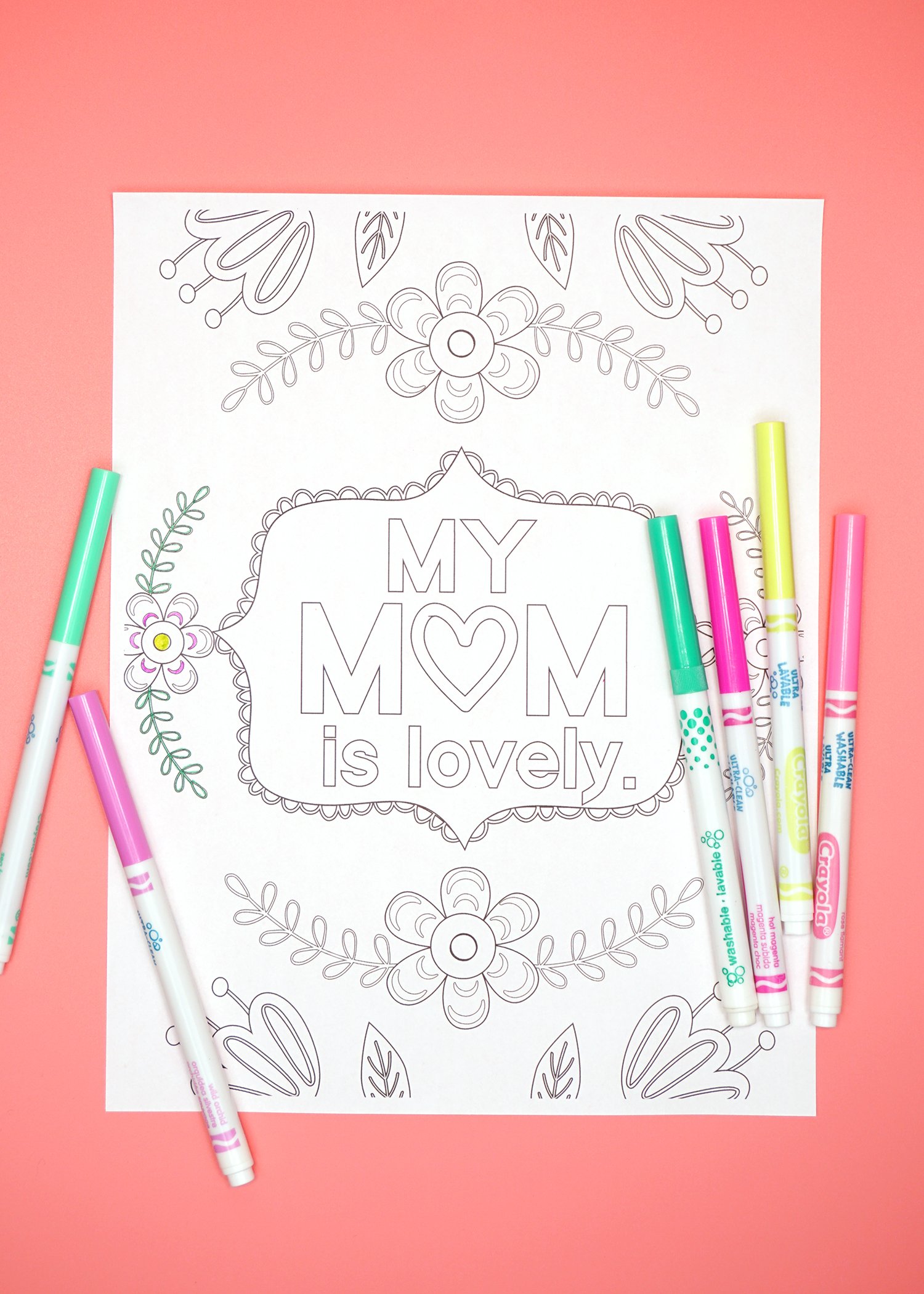 Printable coloring page that reads \"My Mom Is Lovely\" with coloring pens 