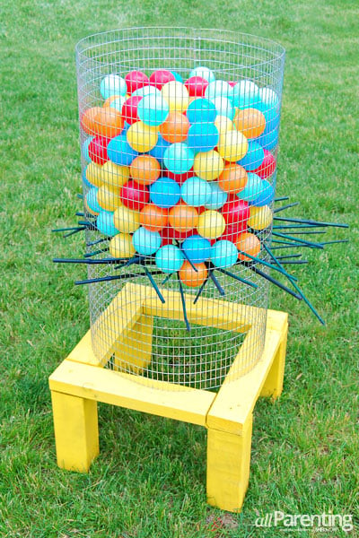 ker plunk game with balls, chicken wire container and sticks ready to be removed to play game